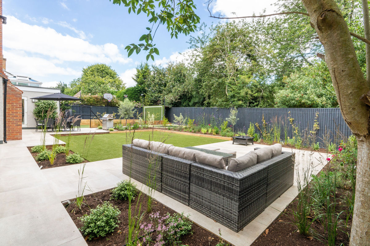 landscaped garden with children's play area