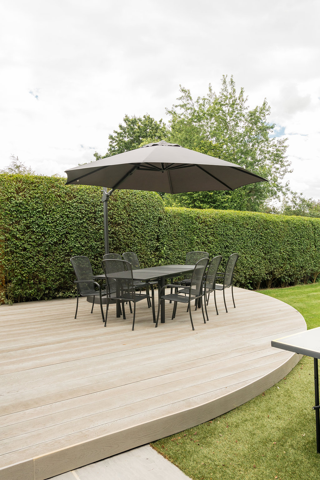 outdoor furniture on landscaped patio area