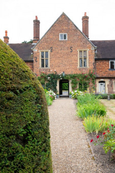 Path flanked by flower beds