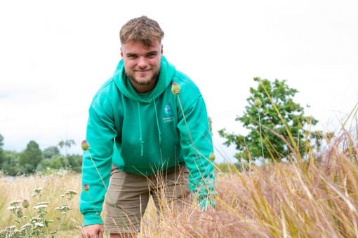 Happy member of the TVL grounds maintenance team