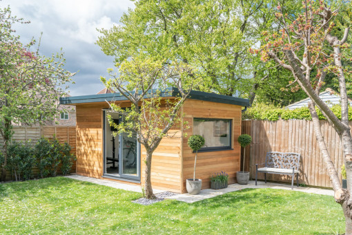 Garden room surrounded by trees