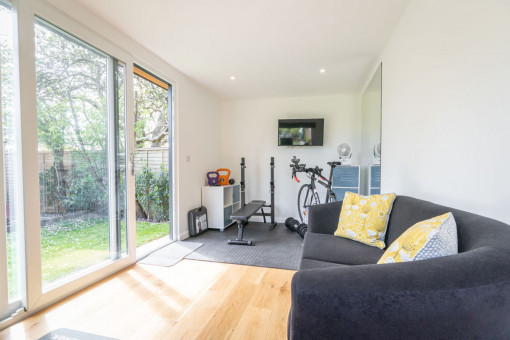 Multipurpose garden room for with office and gym