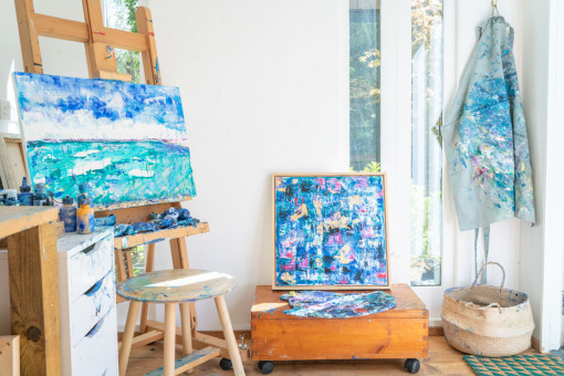 Artists studio with paintings