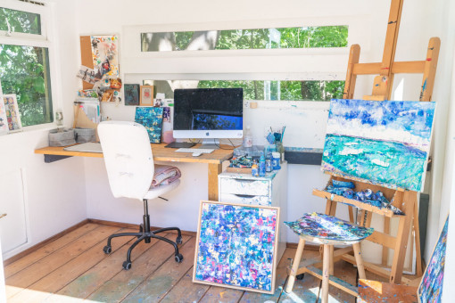 Garden studio full of brightly coloured art