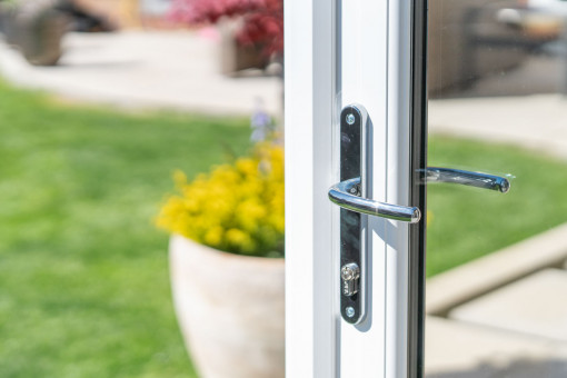 Open garden room door leading to garden