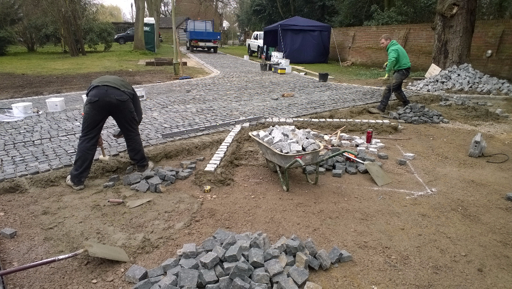 laying the granite setts for a driveway