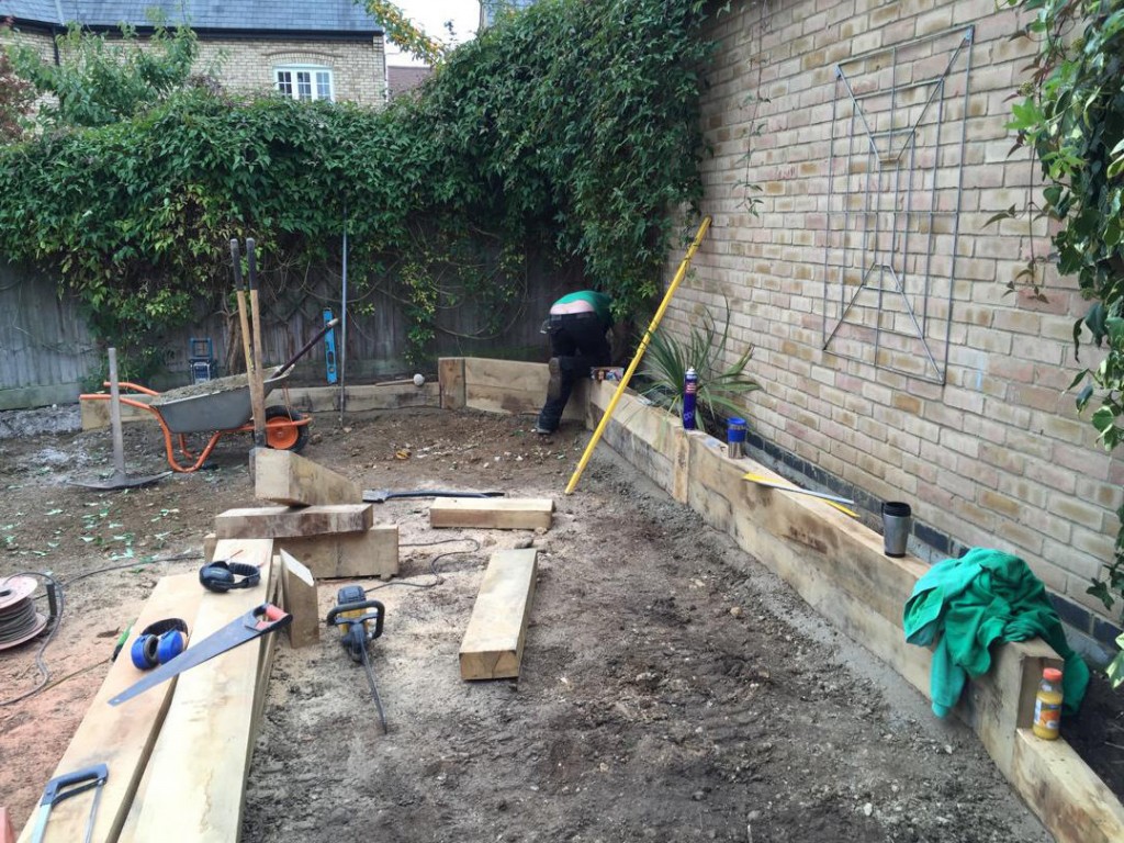 building retaining wall with oak sleepers