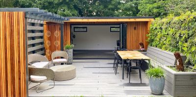 Cedar clad garden room with outdoor lounge and dining