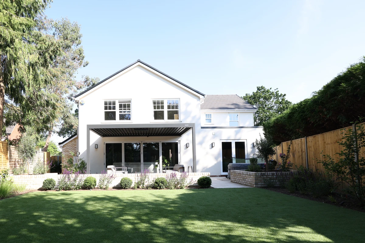 Family garden transformation with large lawn and shaded seating