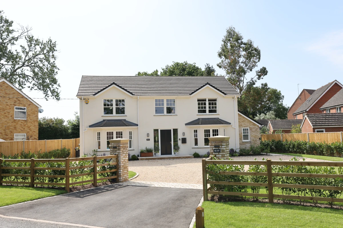 Landscaped front garden with ample parking